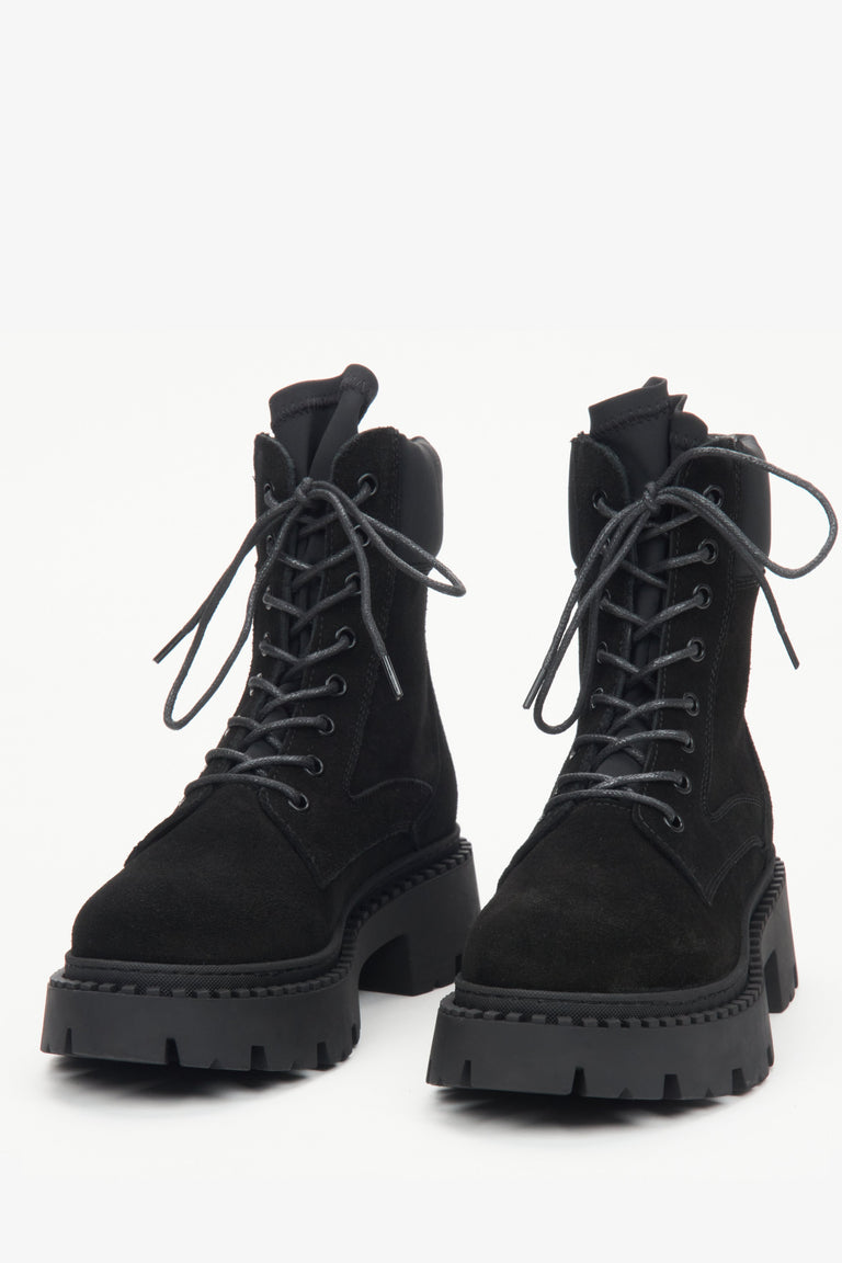 Black lace-up women's ankle boots by Estro - front view of the model.