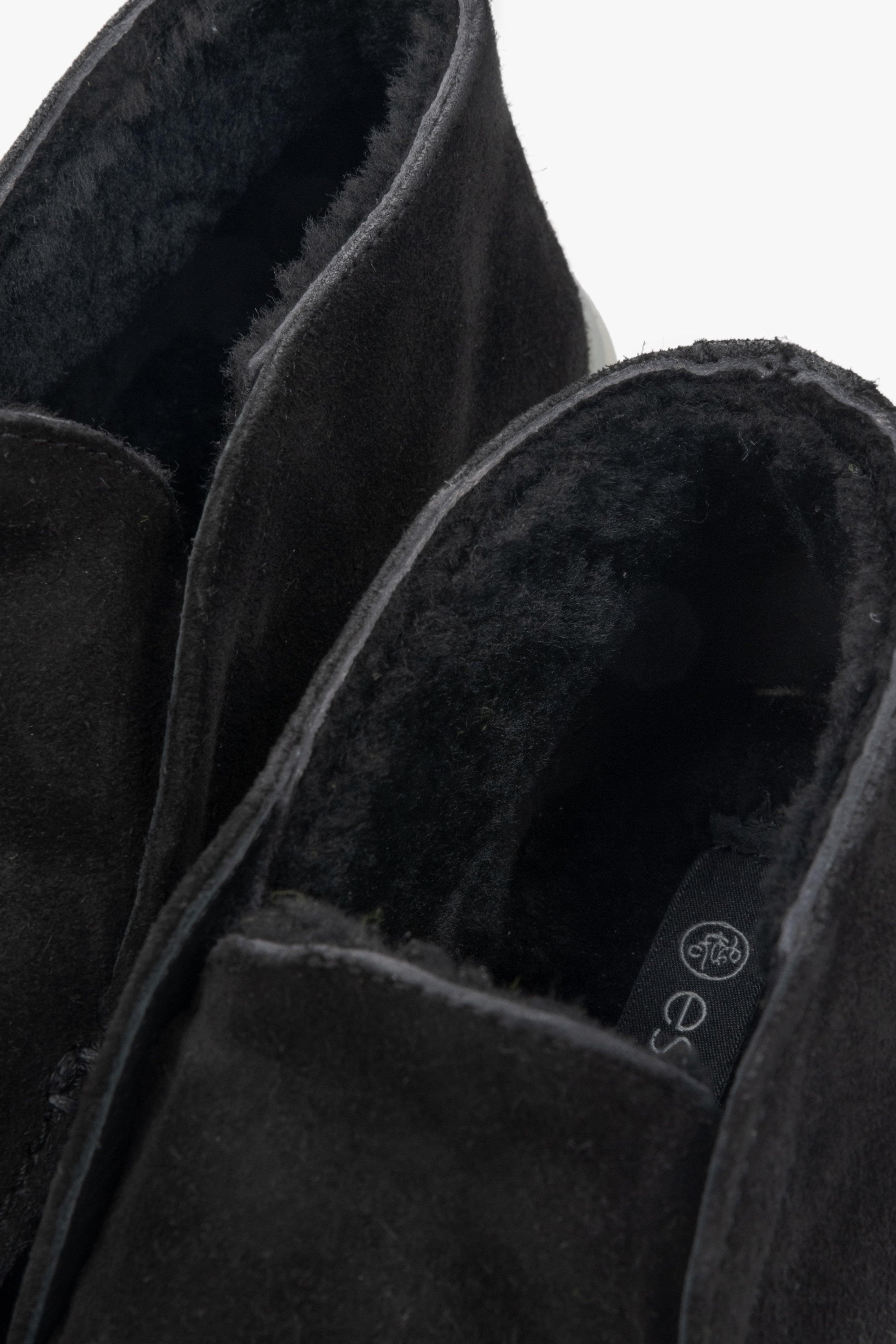 Women's black ankle boots for winter made of natural velour Estro - close-up of the shoe lining.