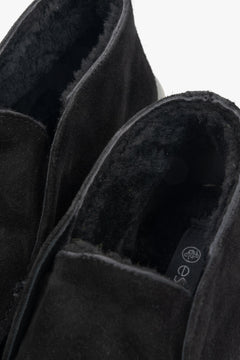 Women's black ankle boots for winter made of natural velour Estro - close-up of the shoe lining.