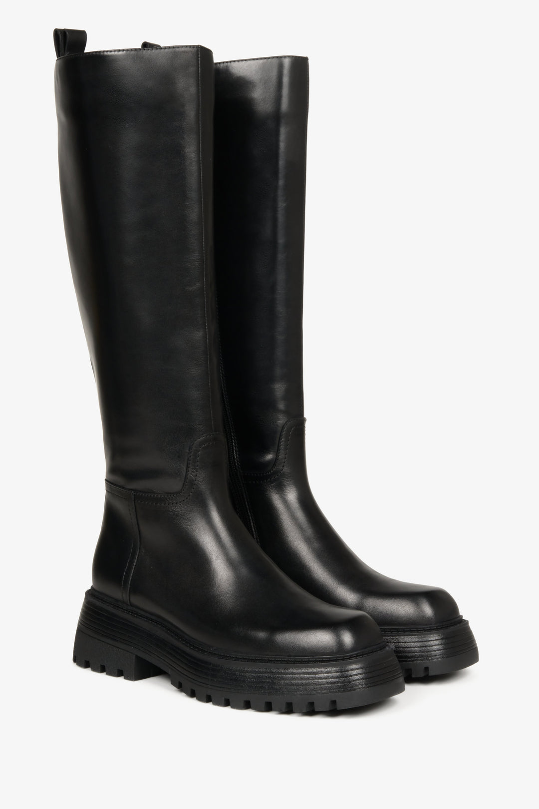 Women's black, elevated fall/spring boots made of genuine leather with a wide shaft - close-up of the profile of Estro brand shoes.