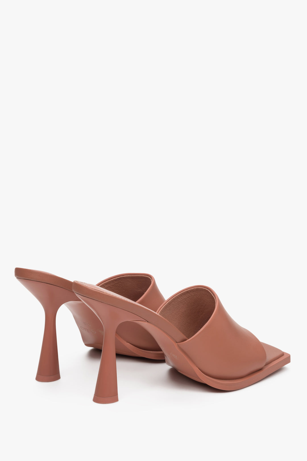 Brown leather women's stiletto mules made of natural leather.