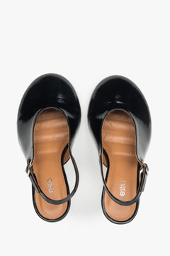 Black slingback heels in Italian patent leather.