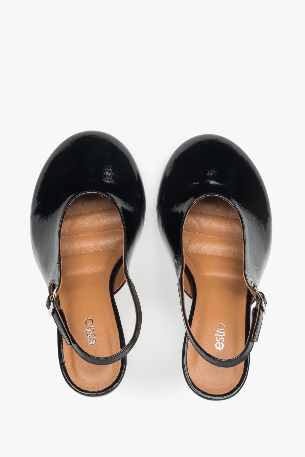Black slingback heels in Italian patent leather.