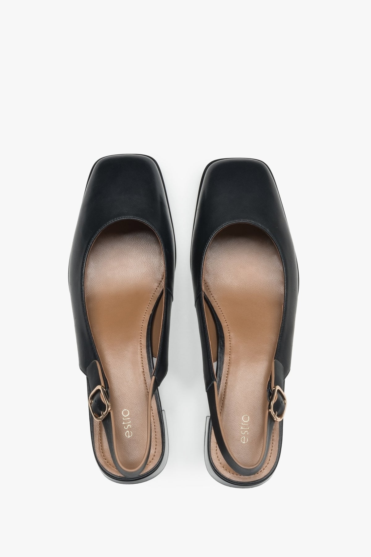 Black Estro pumps, with a slingback design, featuring a comfortable low heel.