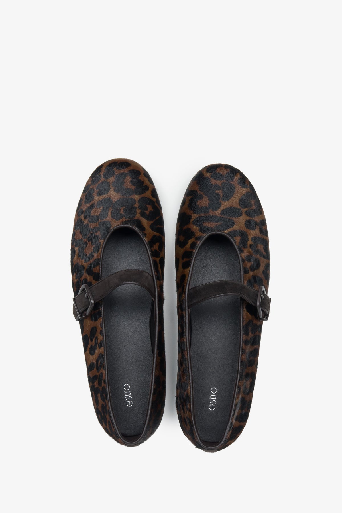 Unique leather ballet flats by Estro, featuring a buckle with a leopard print pattern - top view presentation.