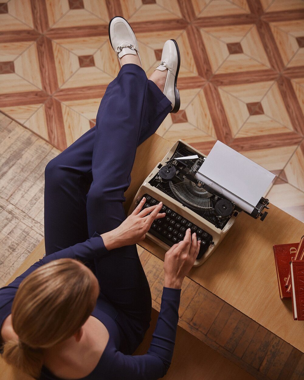 White women's loafers with gold buckle Estro.