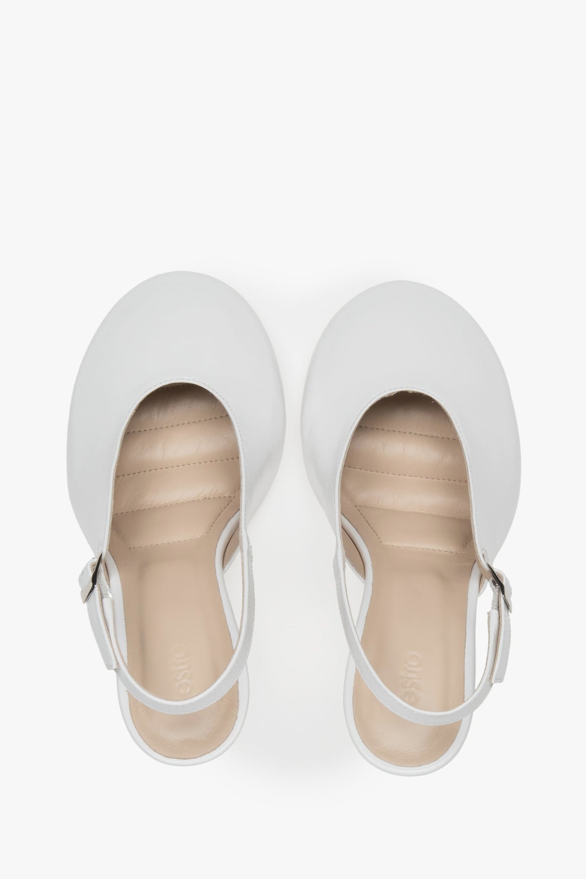 White slingback heels in Italian patent leather.