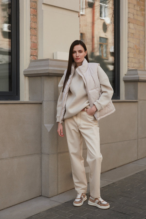 Women's beige and white velour and leather sneakers - presentation on a model.