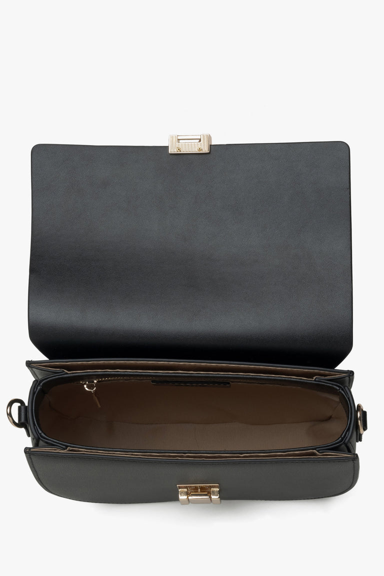 Women's black leather shoulder bag - close-up on the interior.