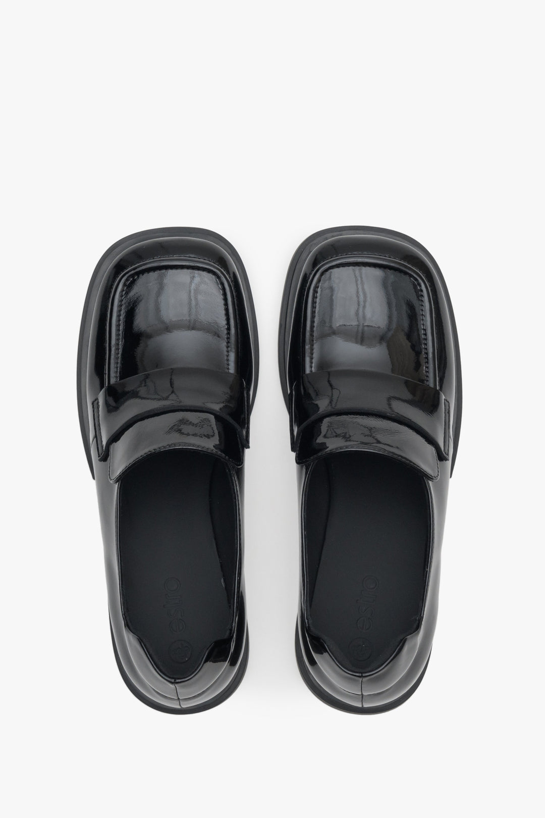 Women's leather, patent leather moccasins in black by Estro - top view presentation of the model.