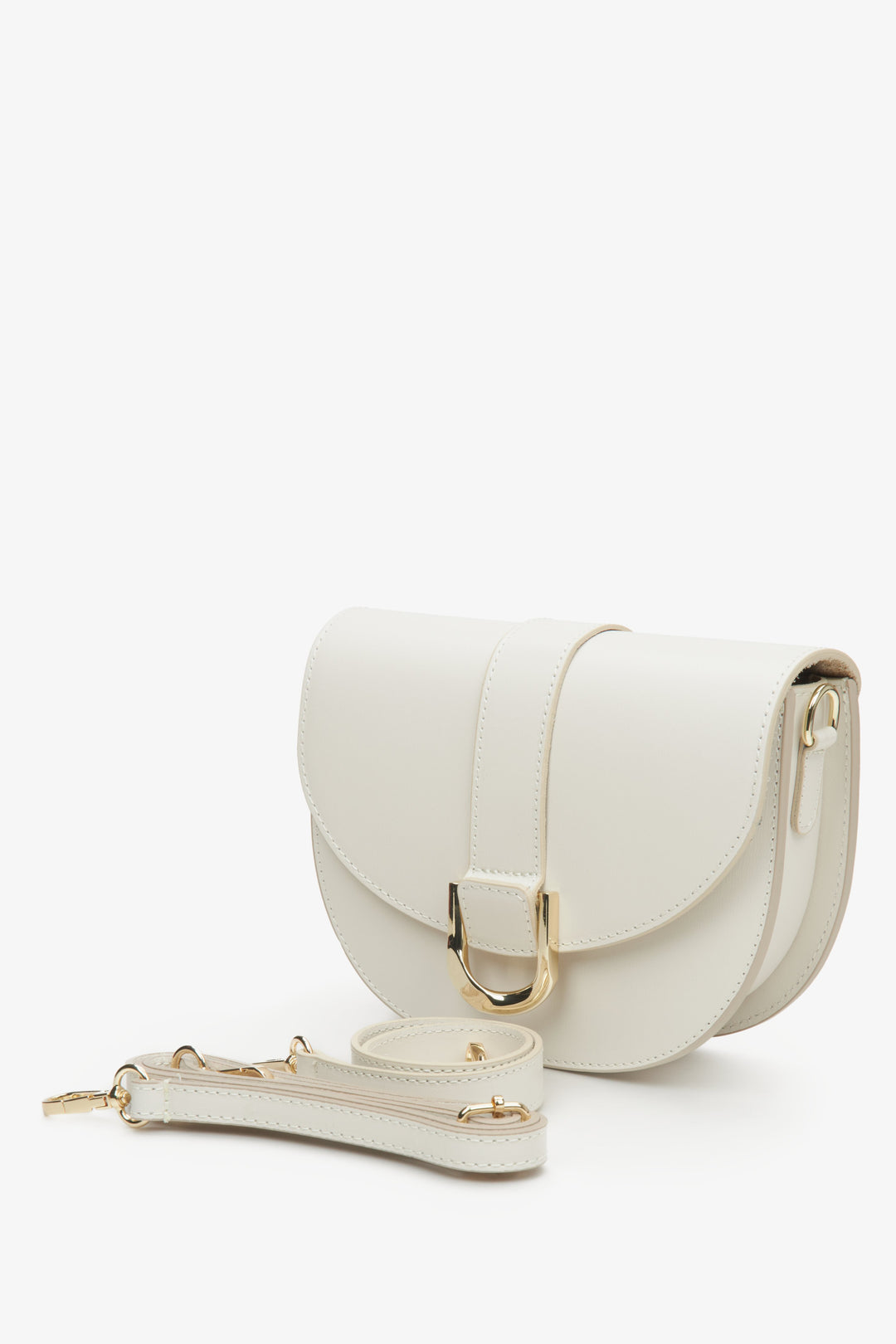 Estro women's cream beige leather crescent-shaped handbag.