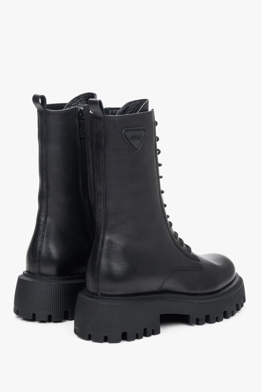 Elevated women's black ankle boots by Estro in genuine leather - rear view of the boot.