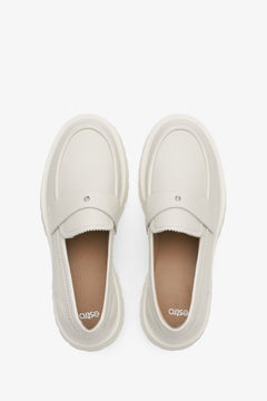 Women's beige leather loafers by Estro.