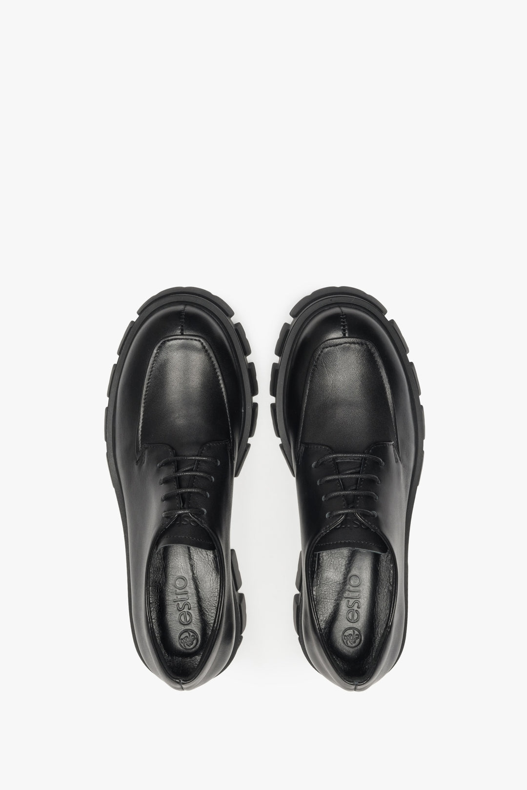 Lace-up women's leather shoes in black - top view presentation of the footwear.