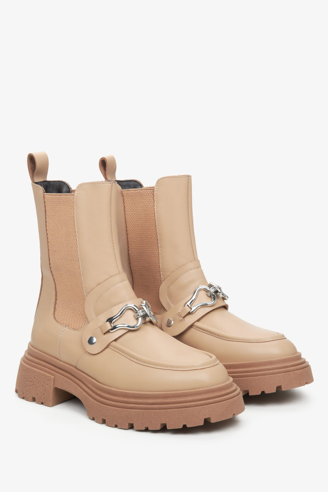 Women's beige leather Chelsea boots with ornament.