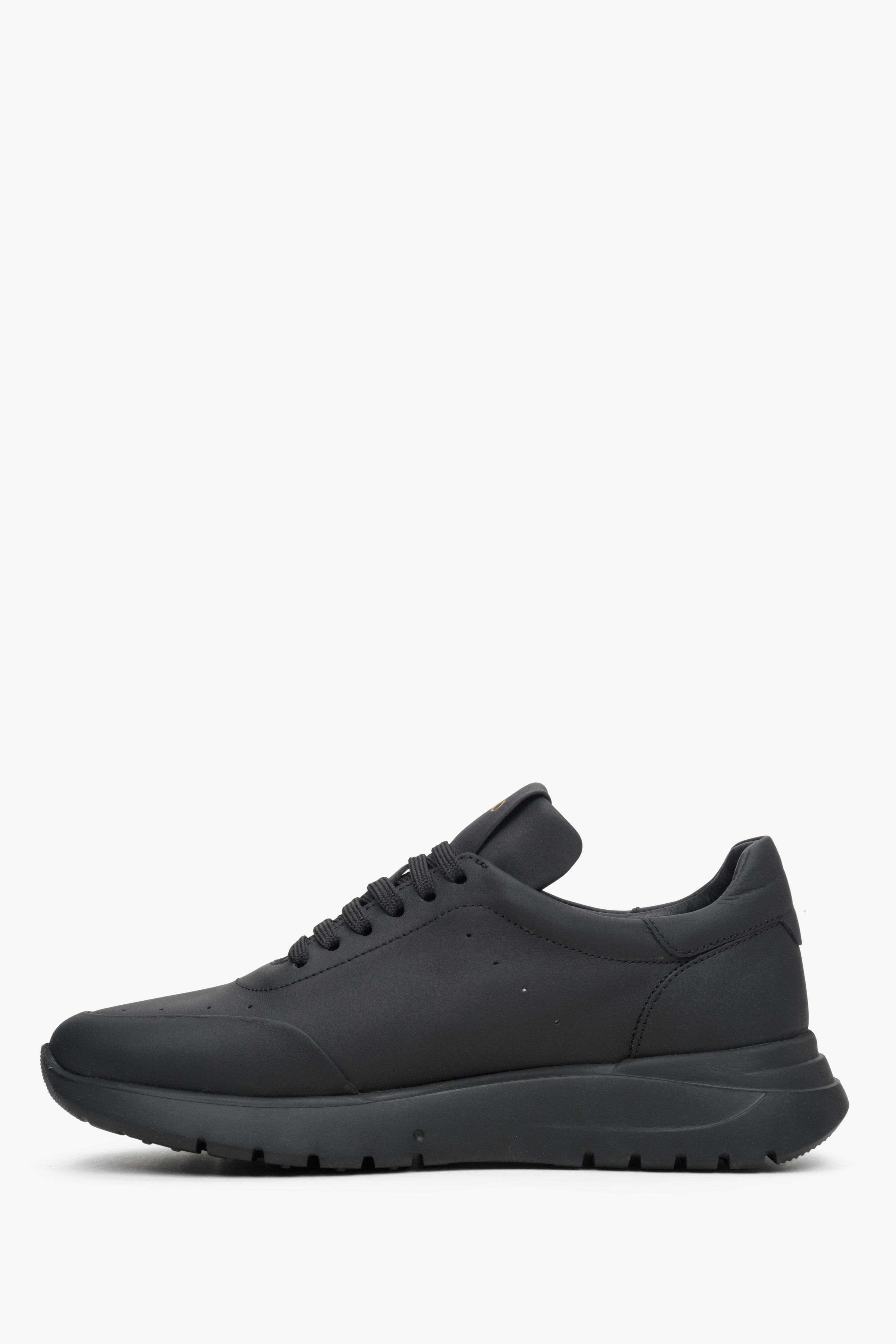 Women's black leather sneakers by Estro - shoe profile.