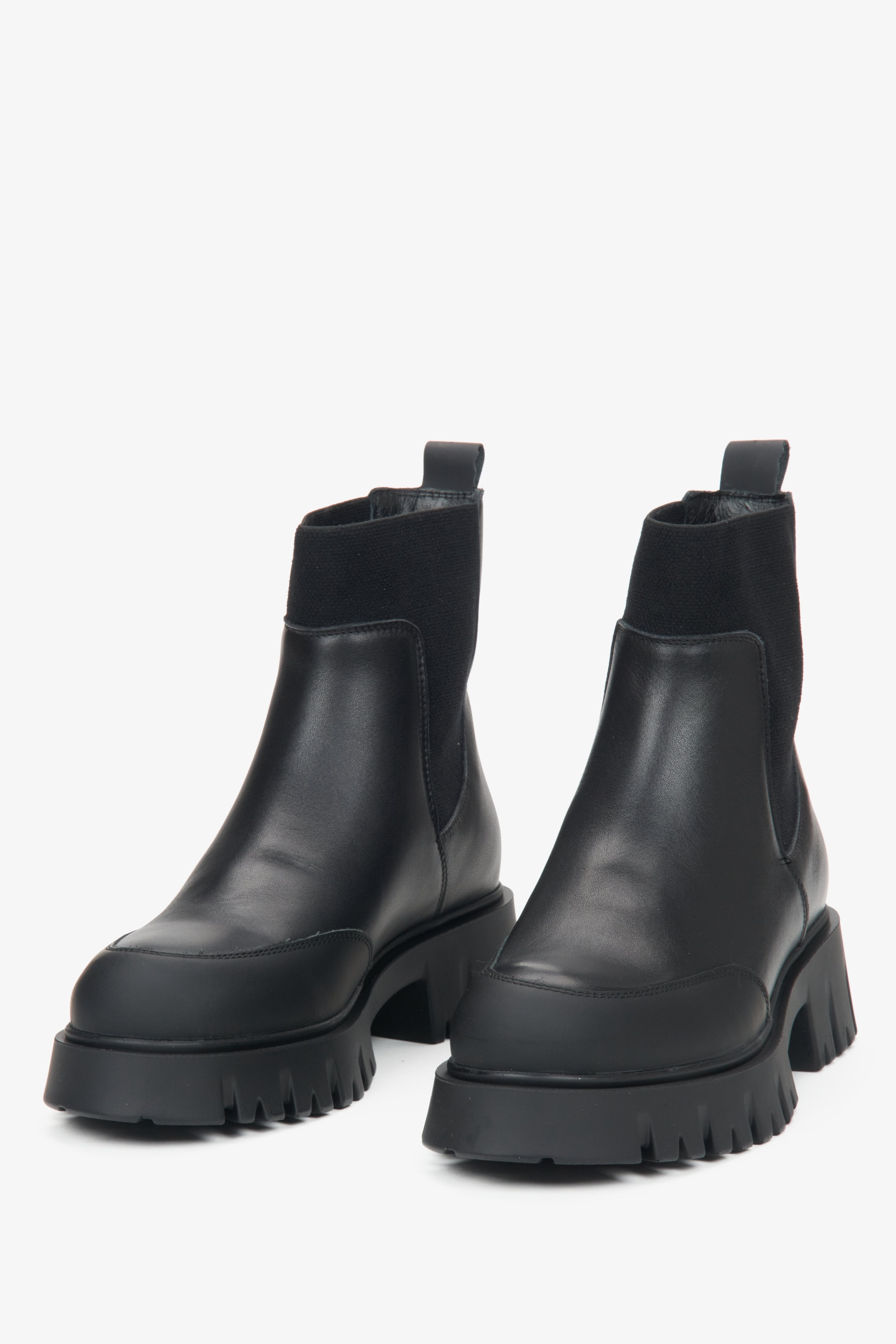 Women's black leather ankle boots for winter Estro - front view of the model.