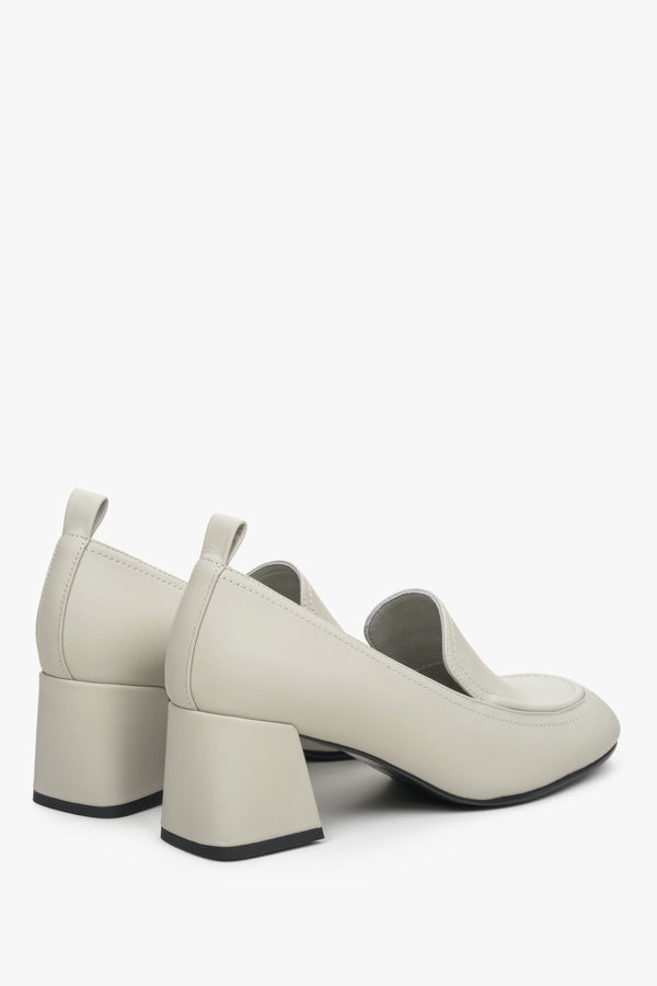 Sturdy block heel light beige leather loafers.