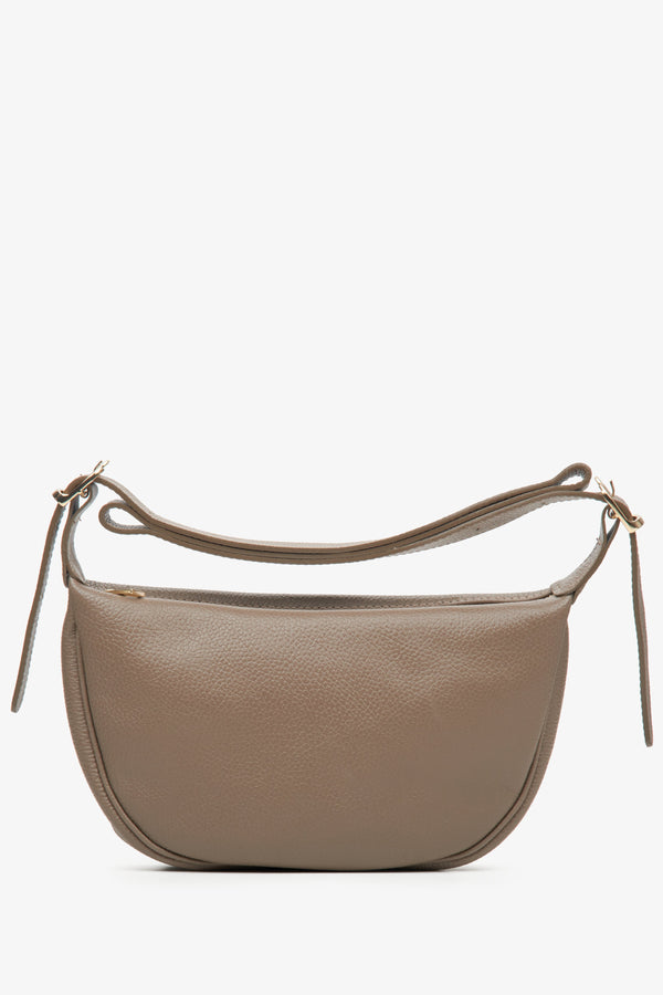 Women's small light brown leather handbag - profile.