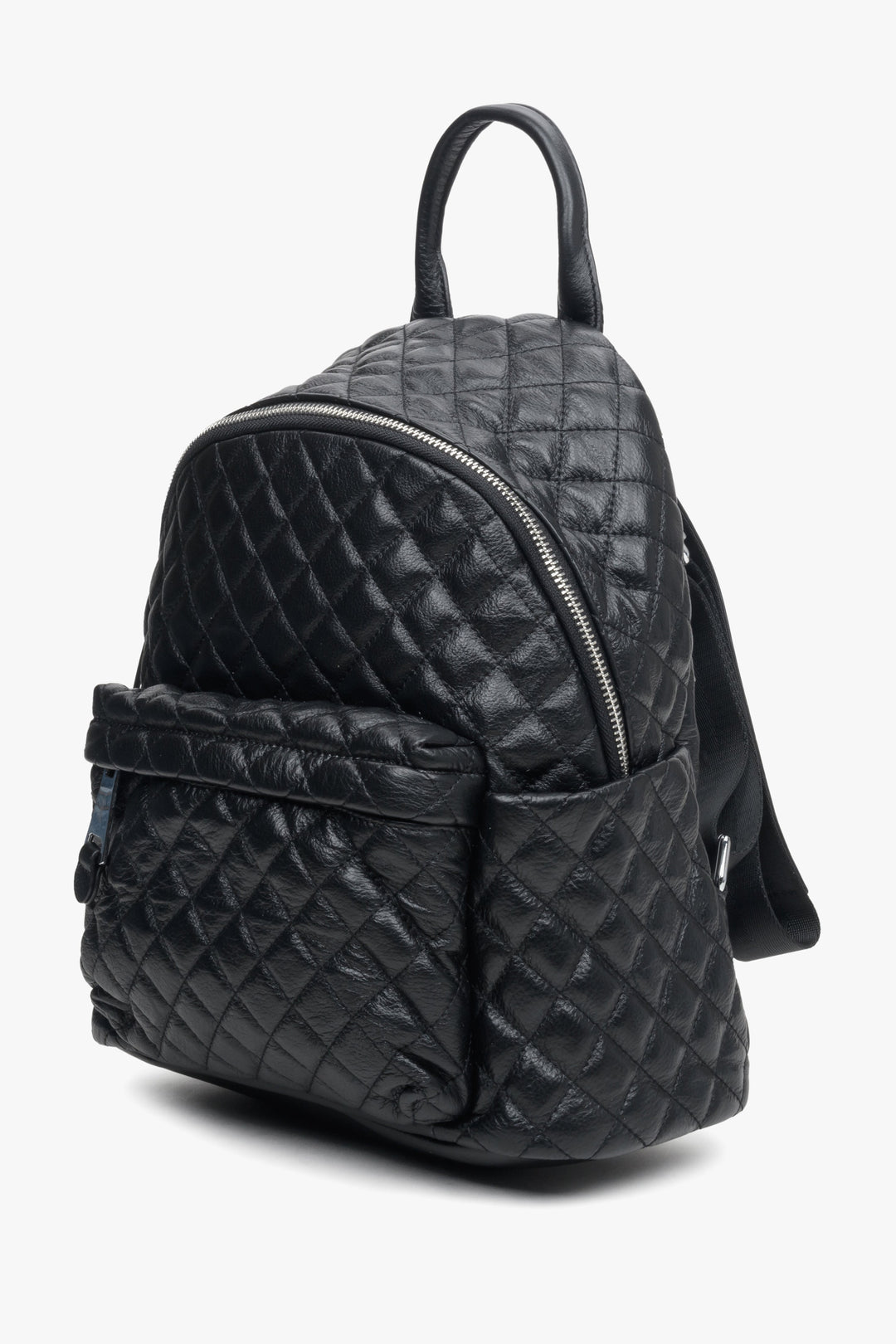 Black quilted leather women's backpack by Estro - side view of the model.