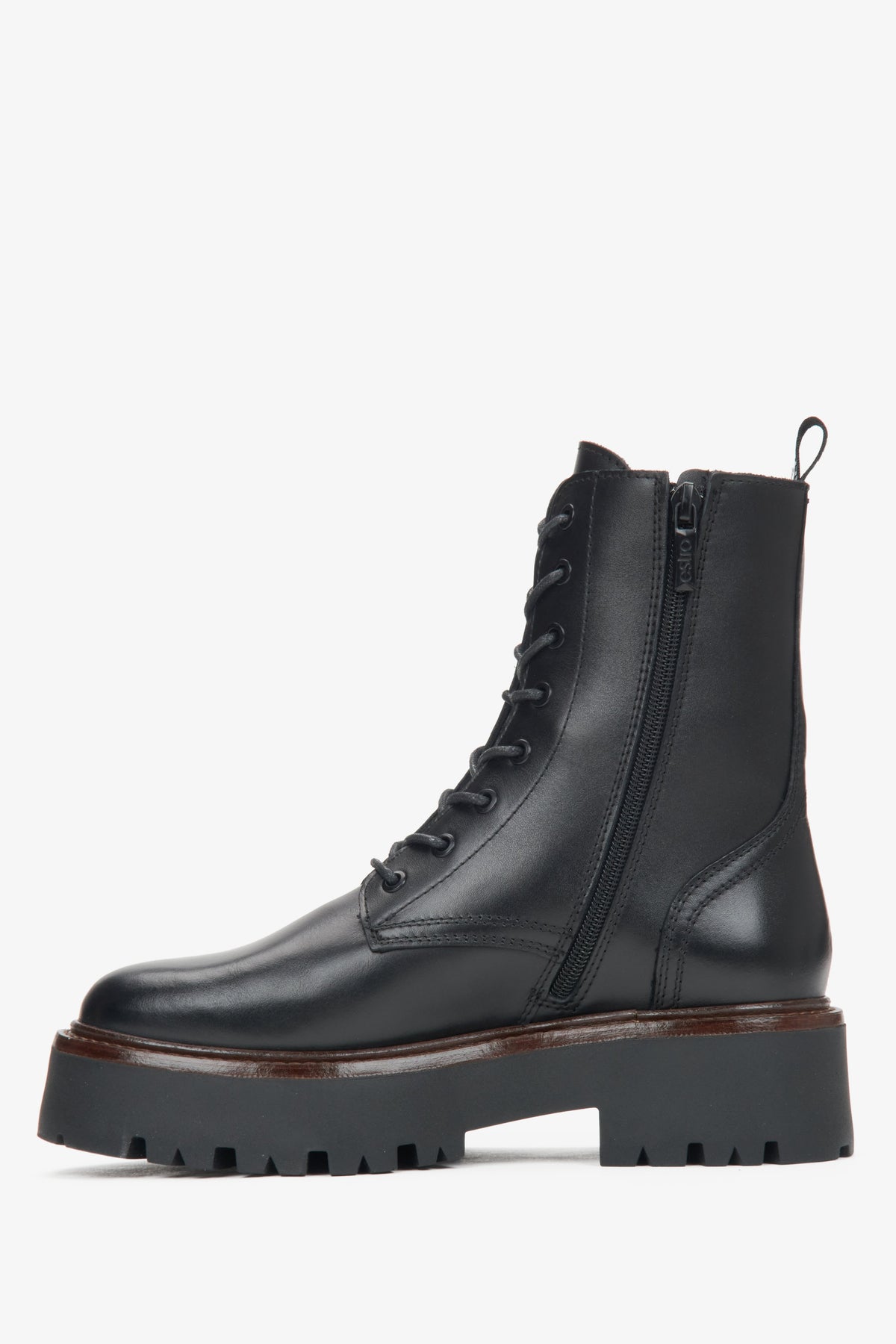 Women's black leather ankle boots made of genuine leather by Estro - side profile of the shoe.