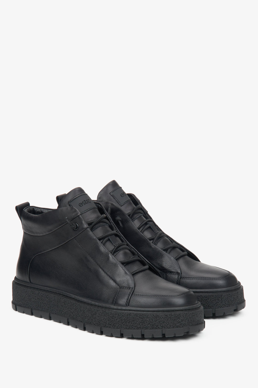 Men's black high-top sneakers by Estro.