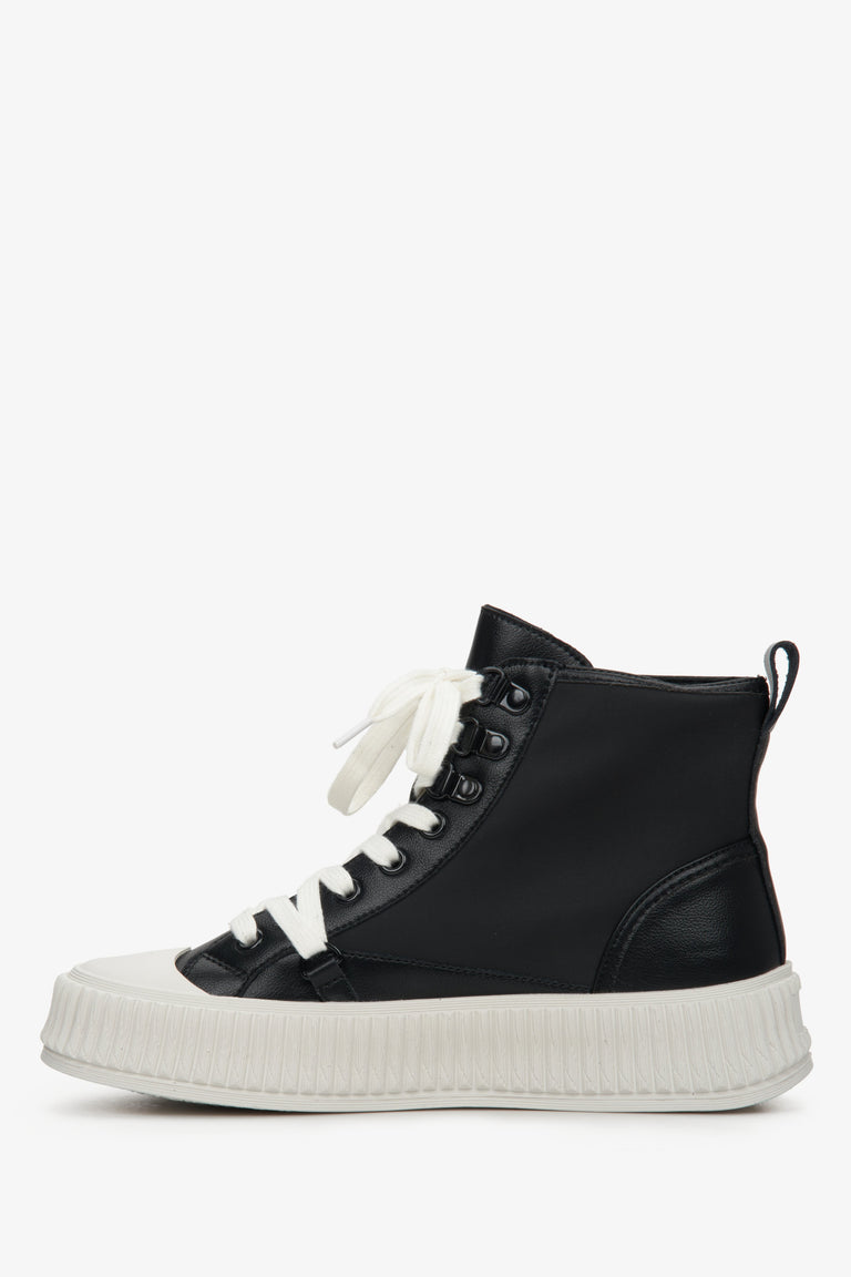 Women's black leather sneakers by Estro - shoe profile.