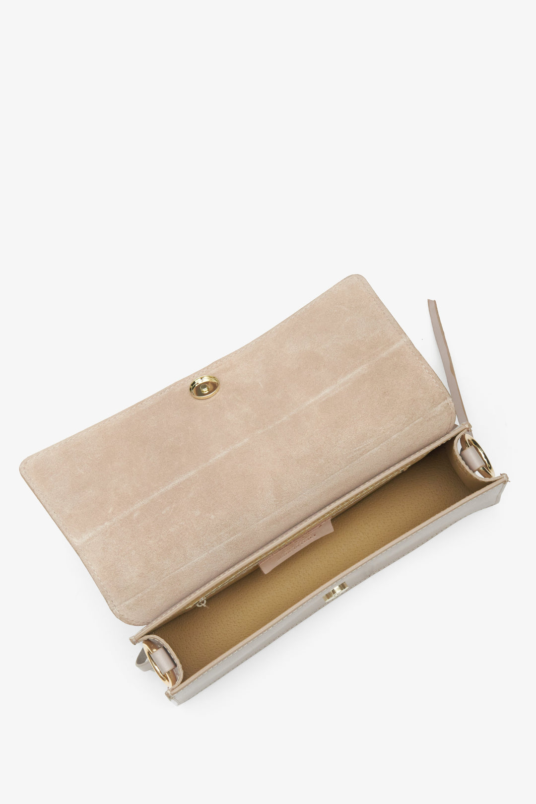 Women's beige leather handbag - a close-up on the main compartment.