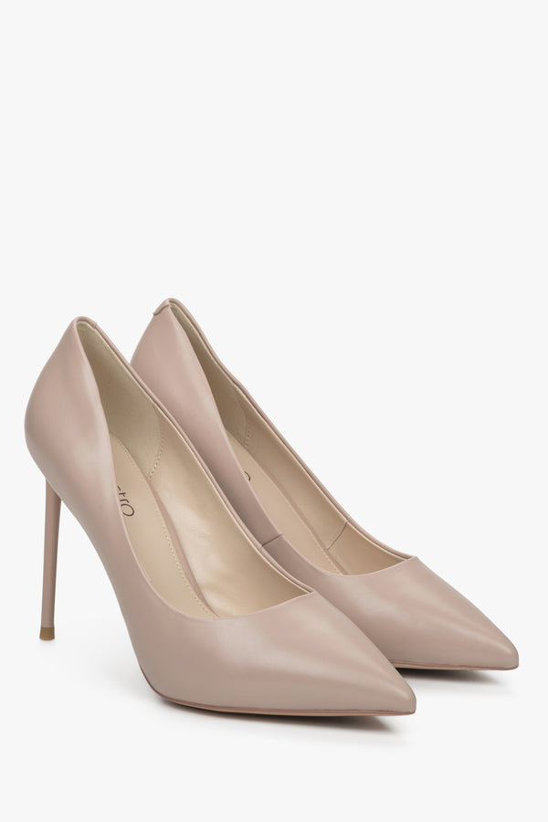 Women's beige leather pointed toe high heels.