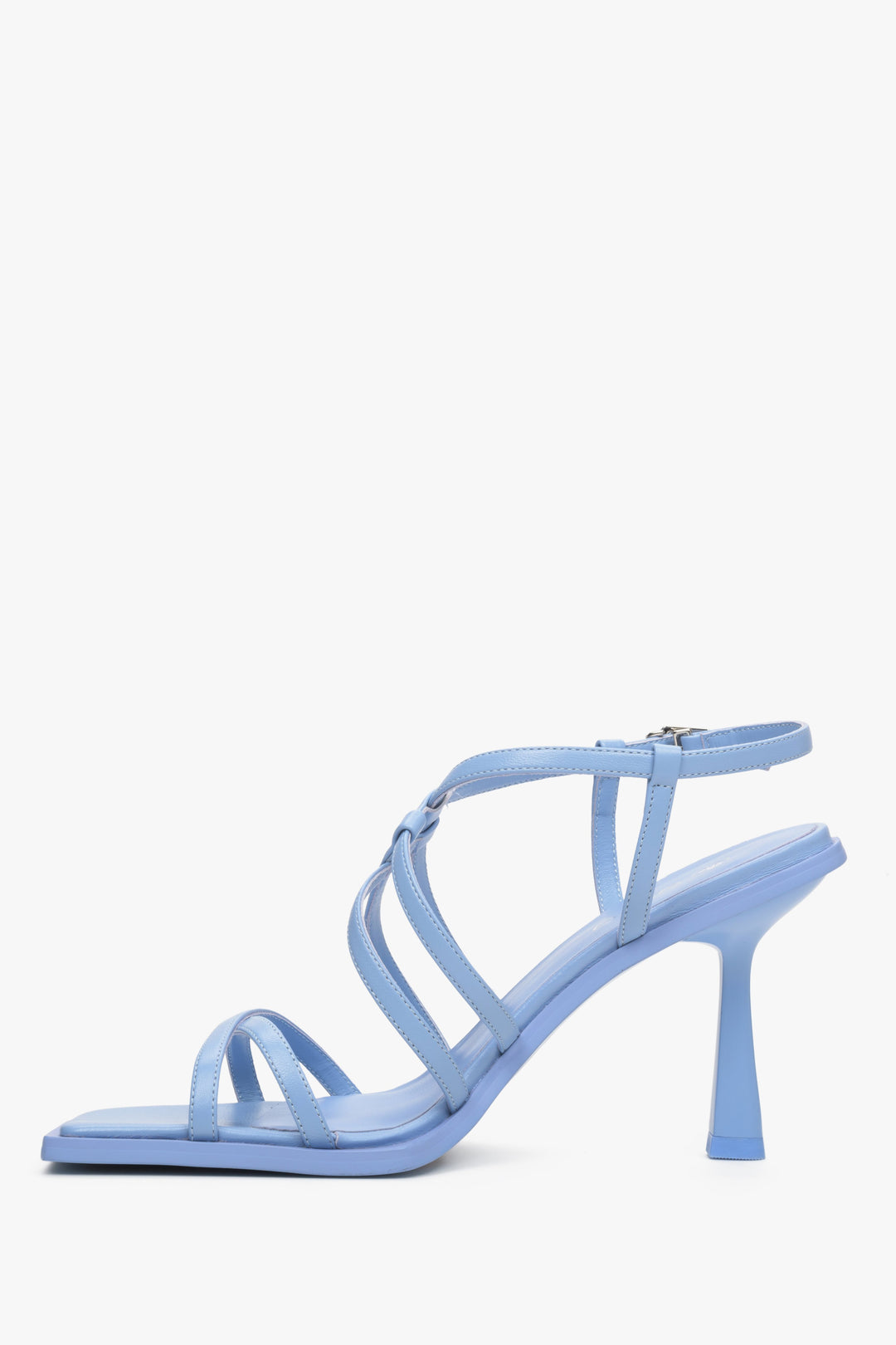 Women's strappy, heeled sandals in light blue colour - shoe profile.
