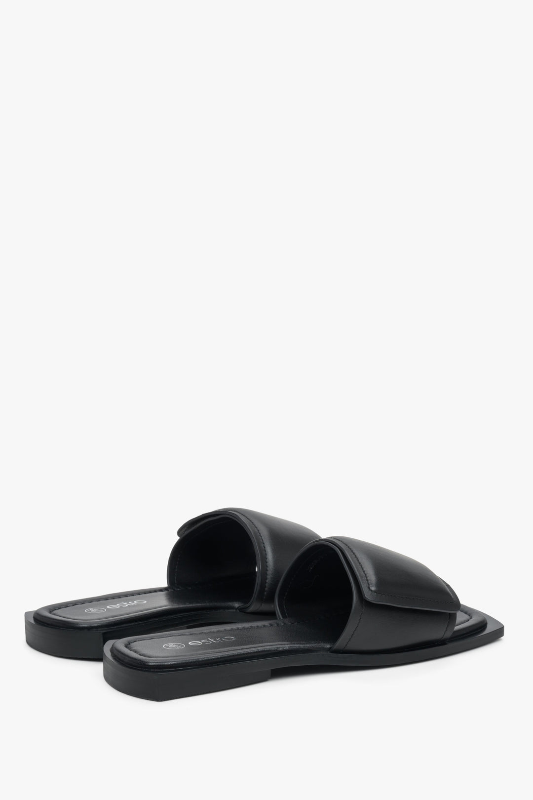 Estro women's slide sandals in black with hook and loop fastening - close-up on shoe sideline.
