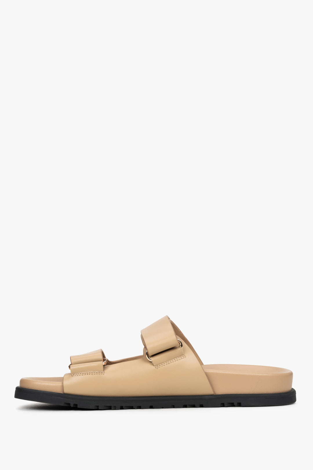 Women's beige leather slides by Estro.