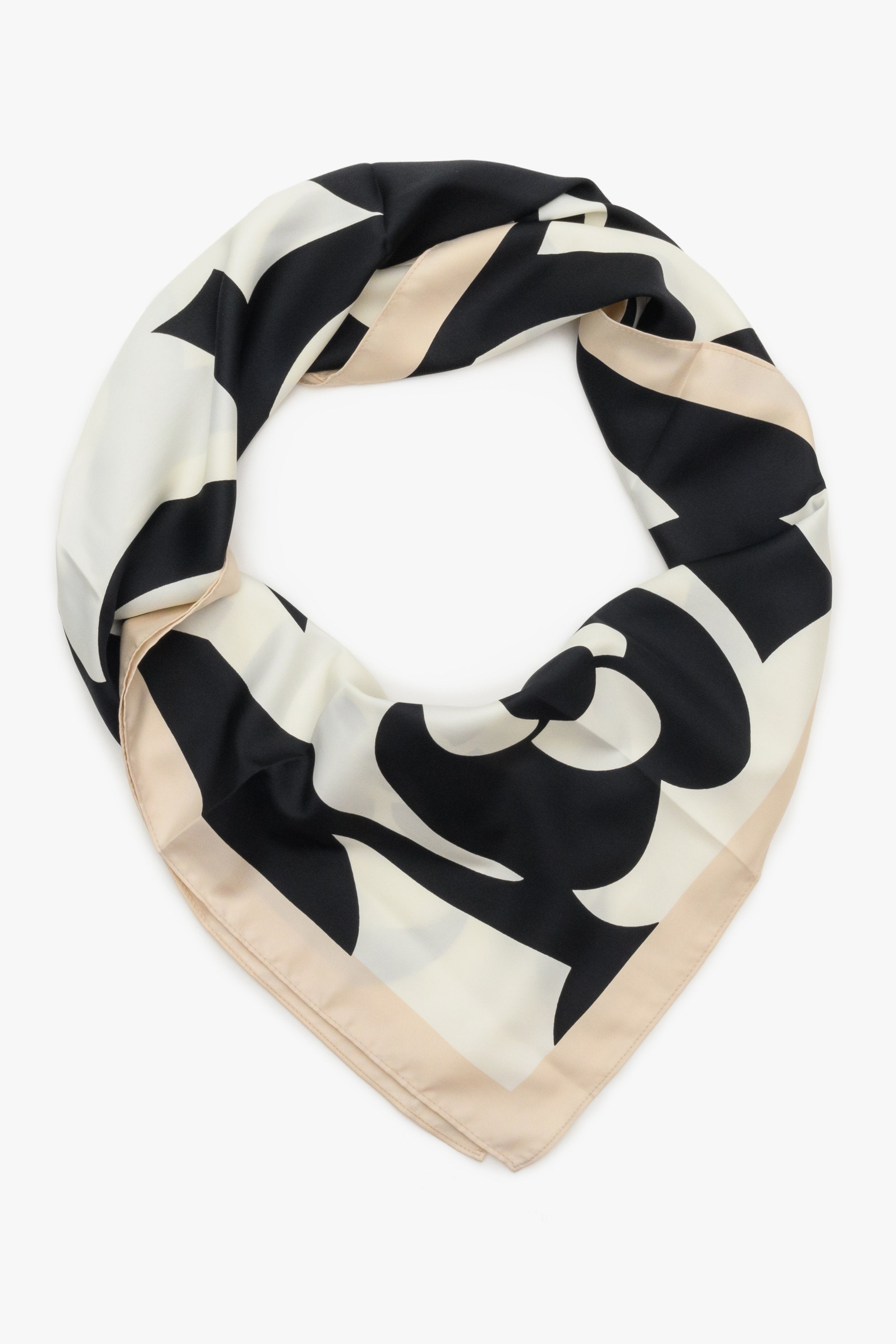 Women's black and white floral neckerchief by Estro.