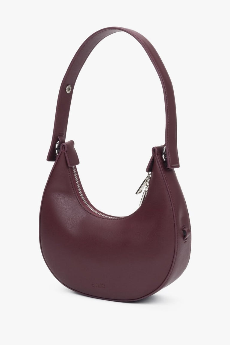 Elegant burgundy women's crescent-shaped handbag, from Estro.