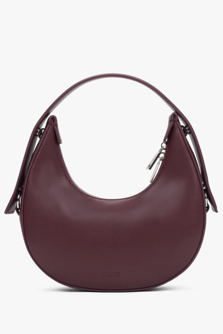 Elegant burgundy women's crescent-shaped handbag, from Estro.