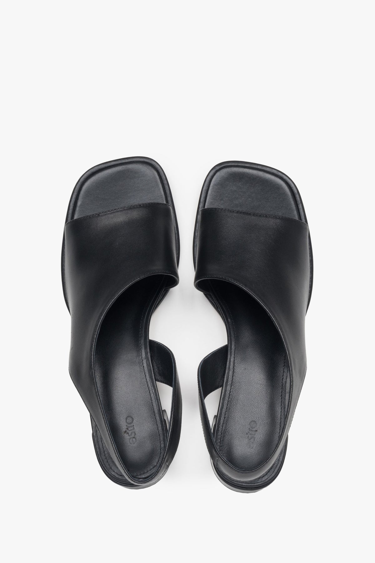 Black leather women's sandals by Estro, perfect for everyday wear, featuring a subtle low heel – top view presentation.