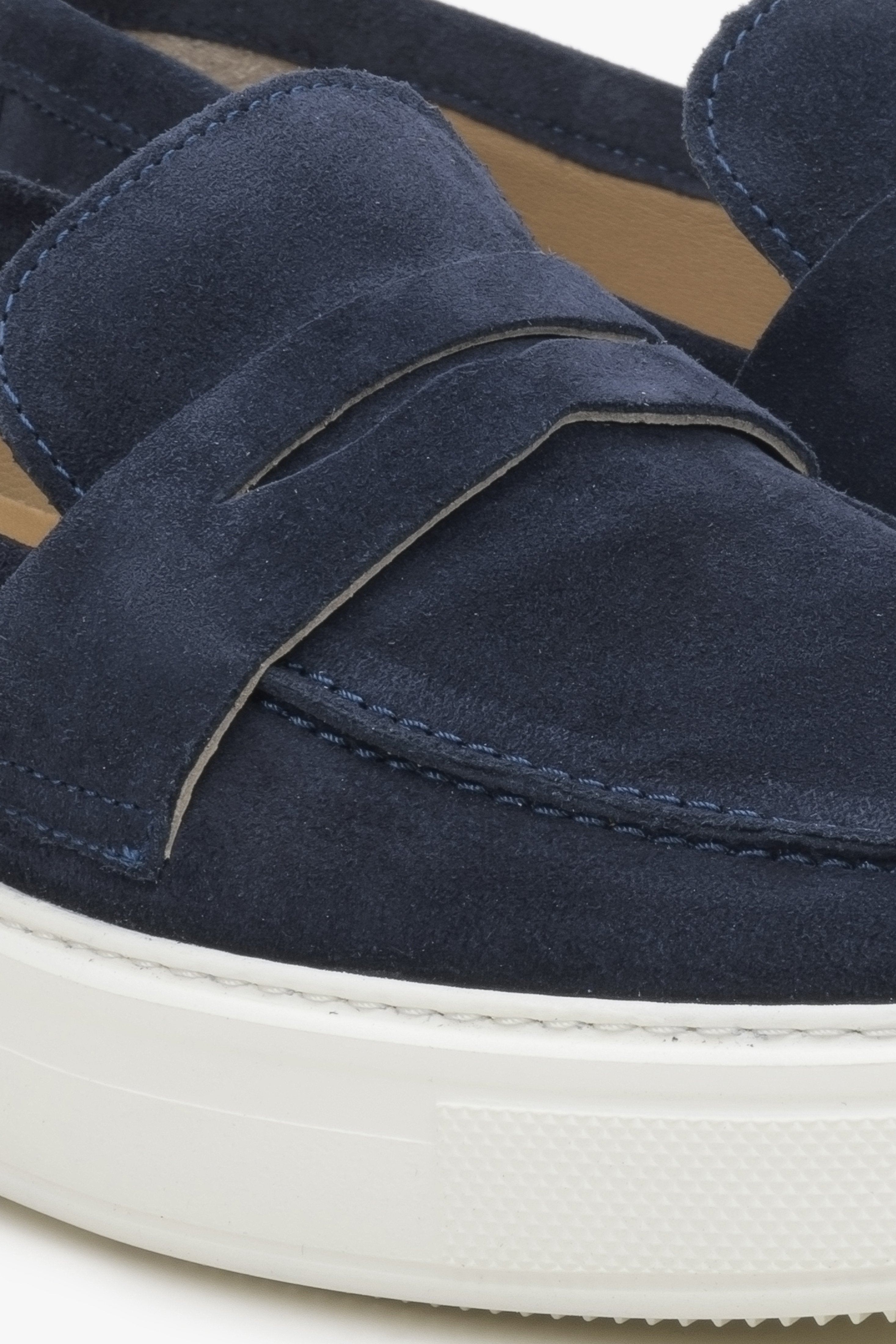 Men's bkue velour moccasins by Estro - close-up on details.