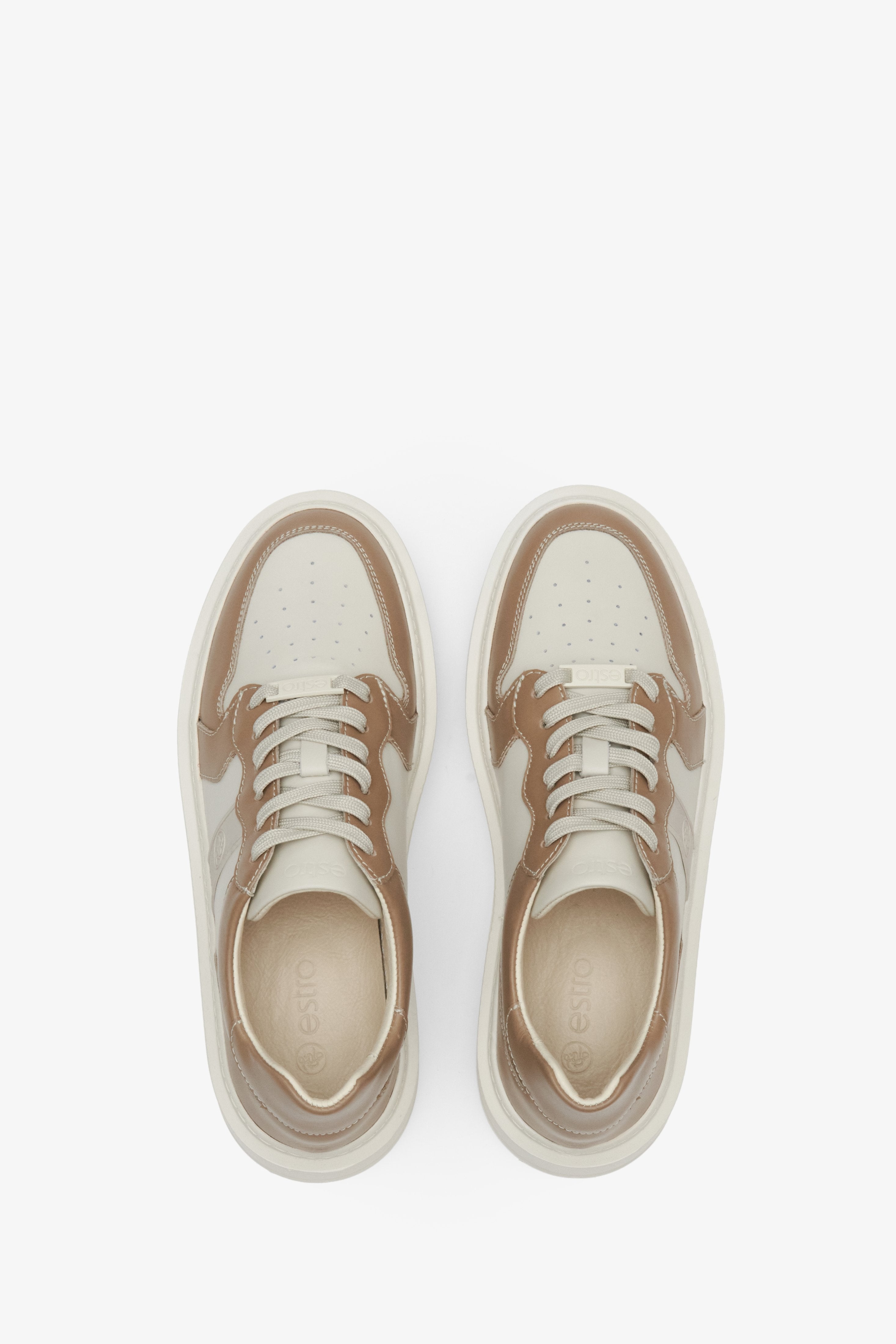 Leather women's beige and brown Estro sneakers with laces - top view presentation of the footwear.