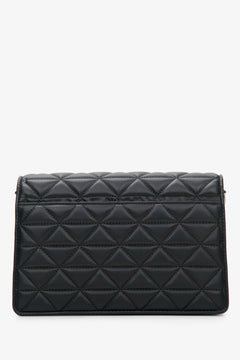 Women's Estro black leather shoulder bag - back view of the model.