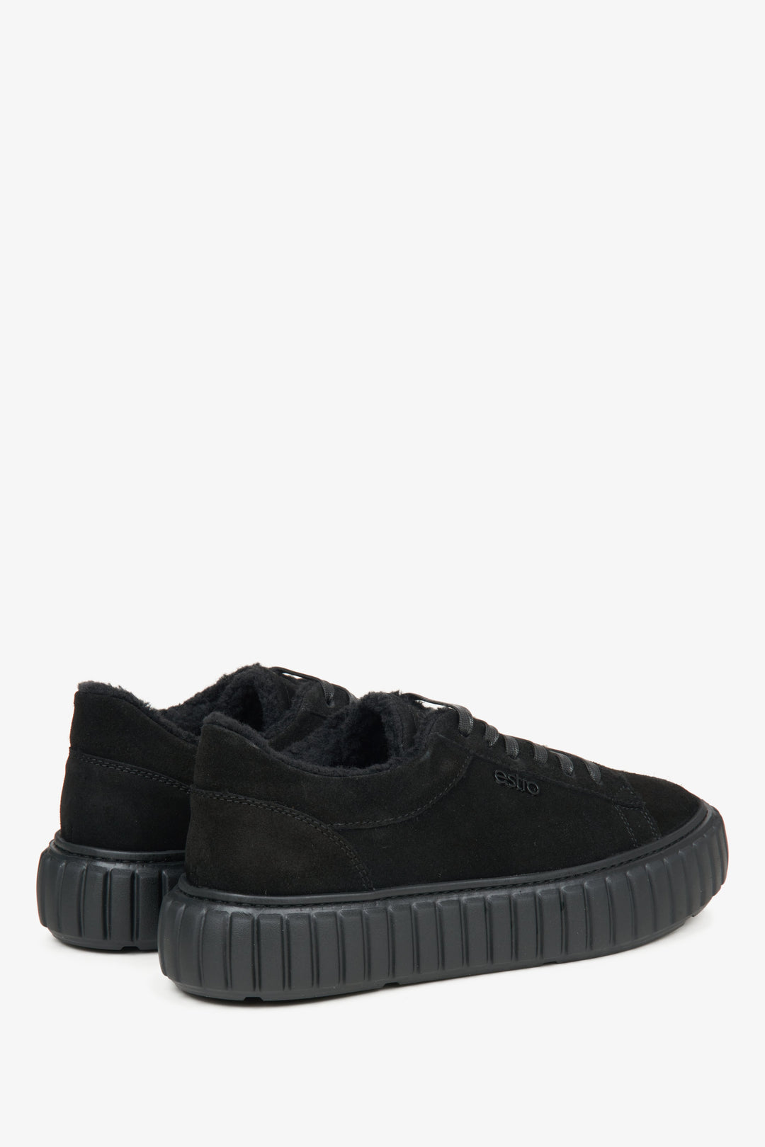 Women's black velour low-top sneakers.