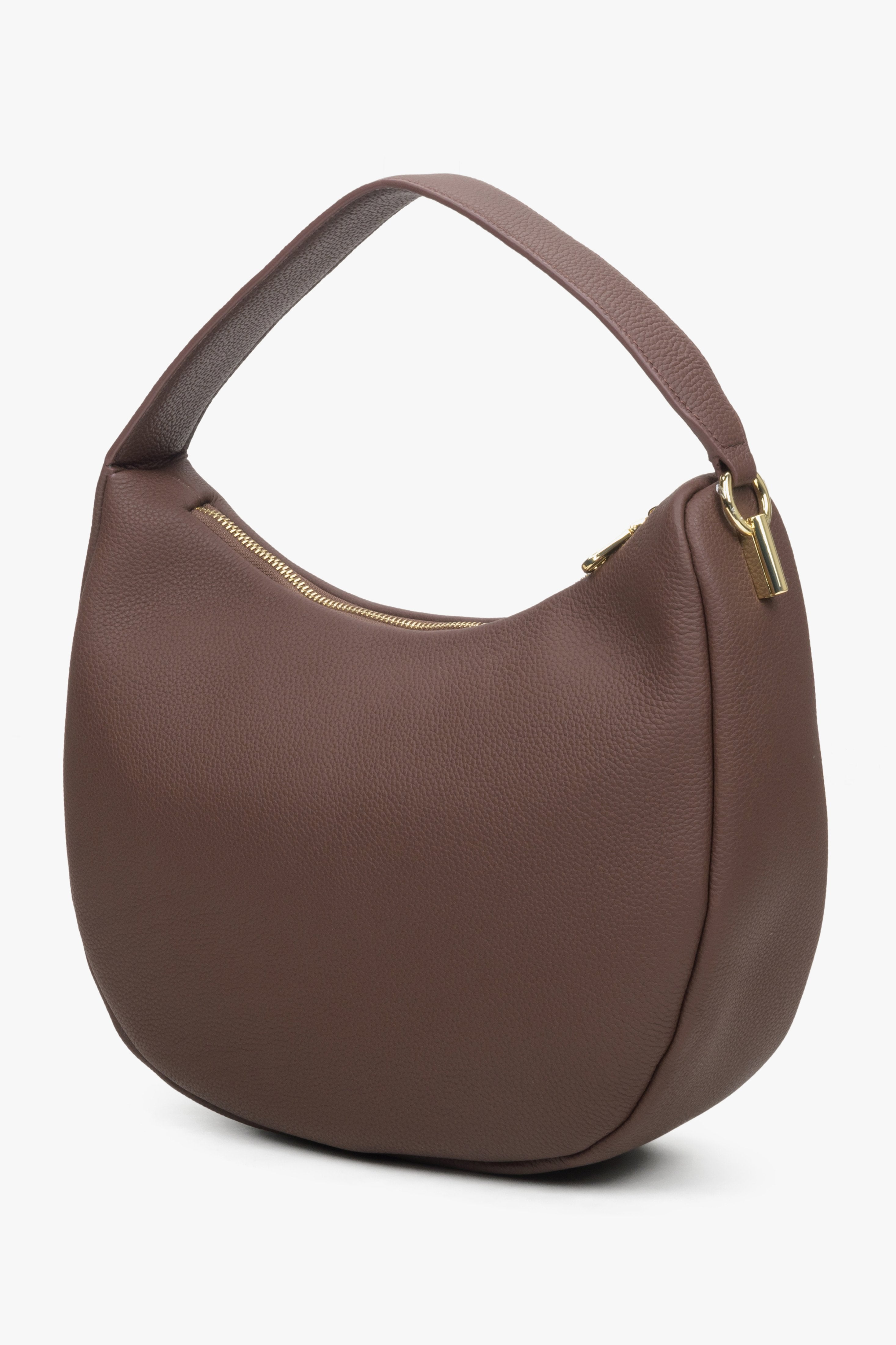 Women's crescent-shaped handbag in brown by Estro.