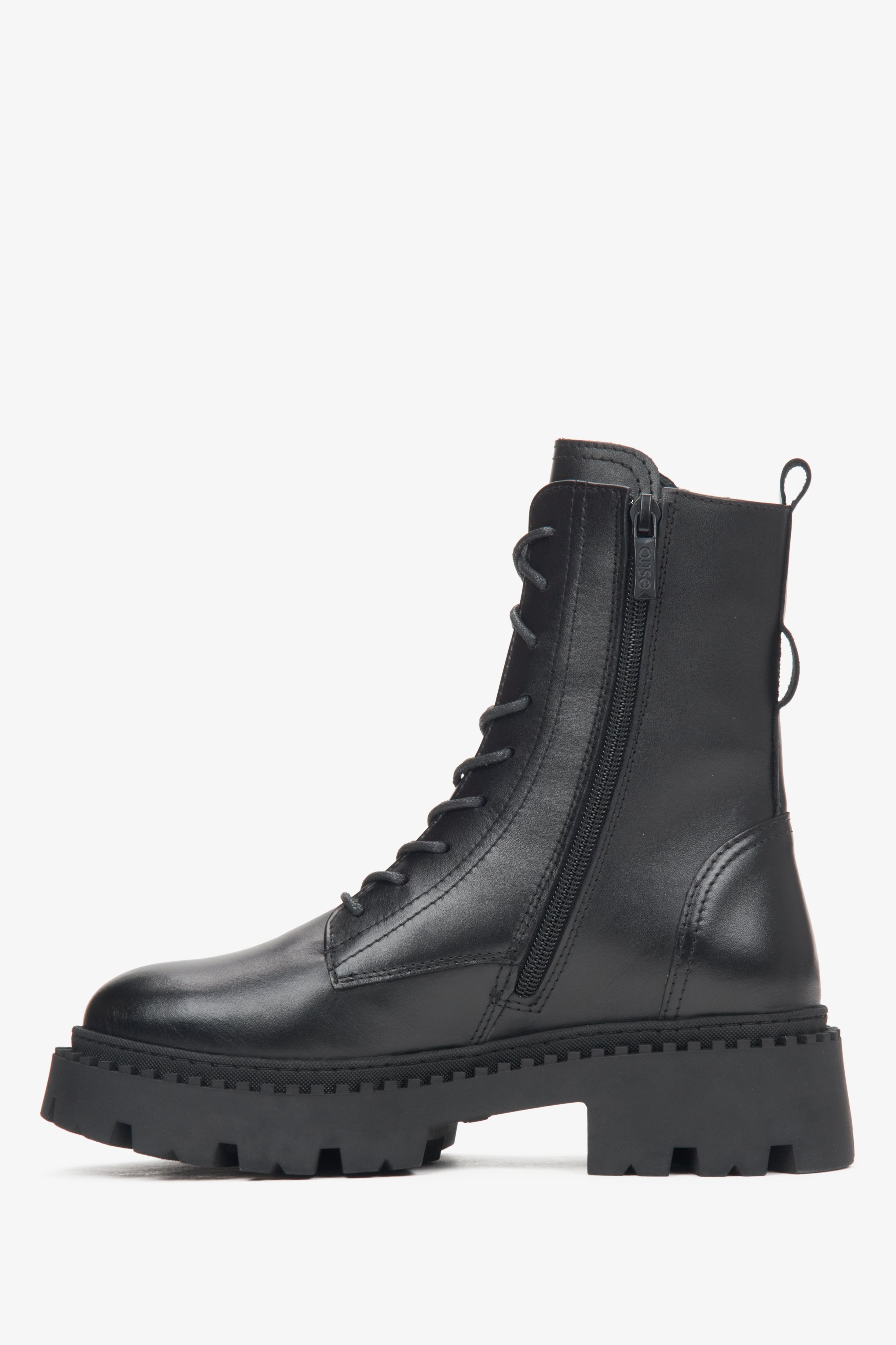 Women's black leather ankle boots made of Italian genuine leather - side profile of the shoe.