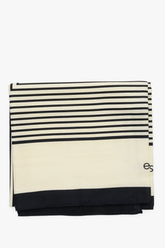 Elegant women's neckerchief in beige and black by Estro.