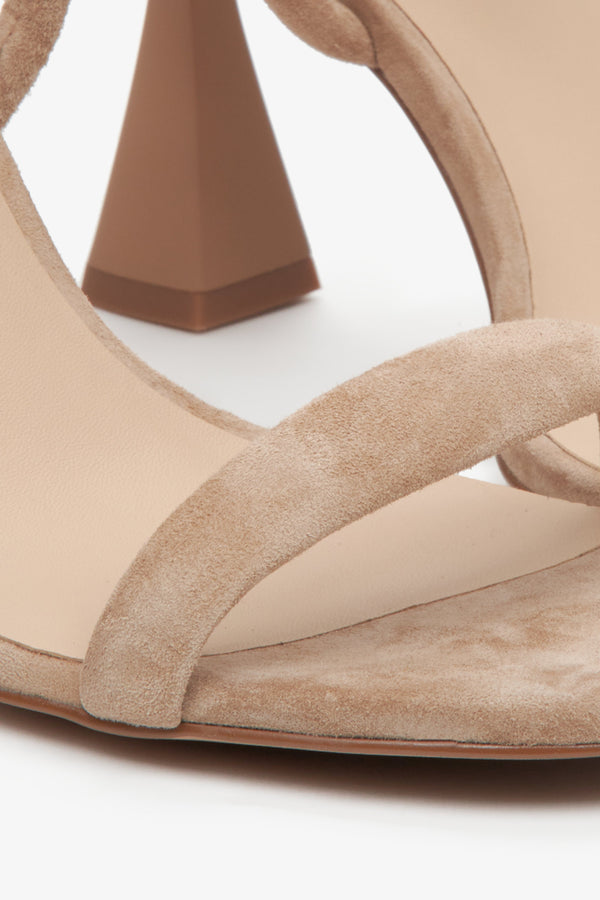 Women's beige strappy sandals on a funnel heel, Estro brand. Close-up on details.