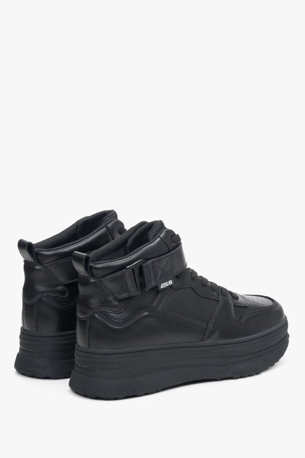 Leather, high-top women's sneakers ES8 in black color - close-up on the side line of the shoe.