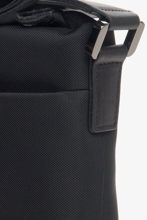 Men's small black  bag by Estro - close-up on the detail.