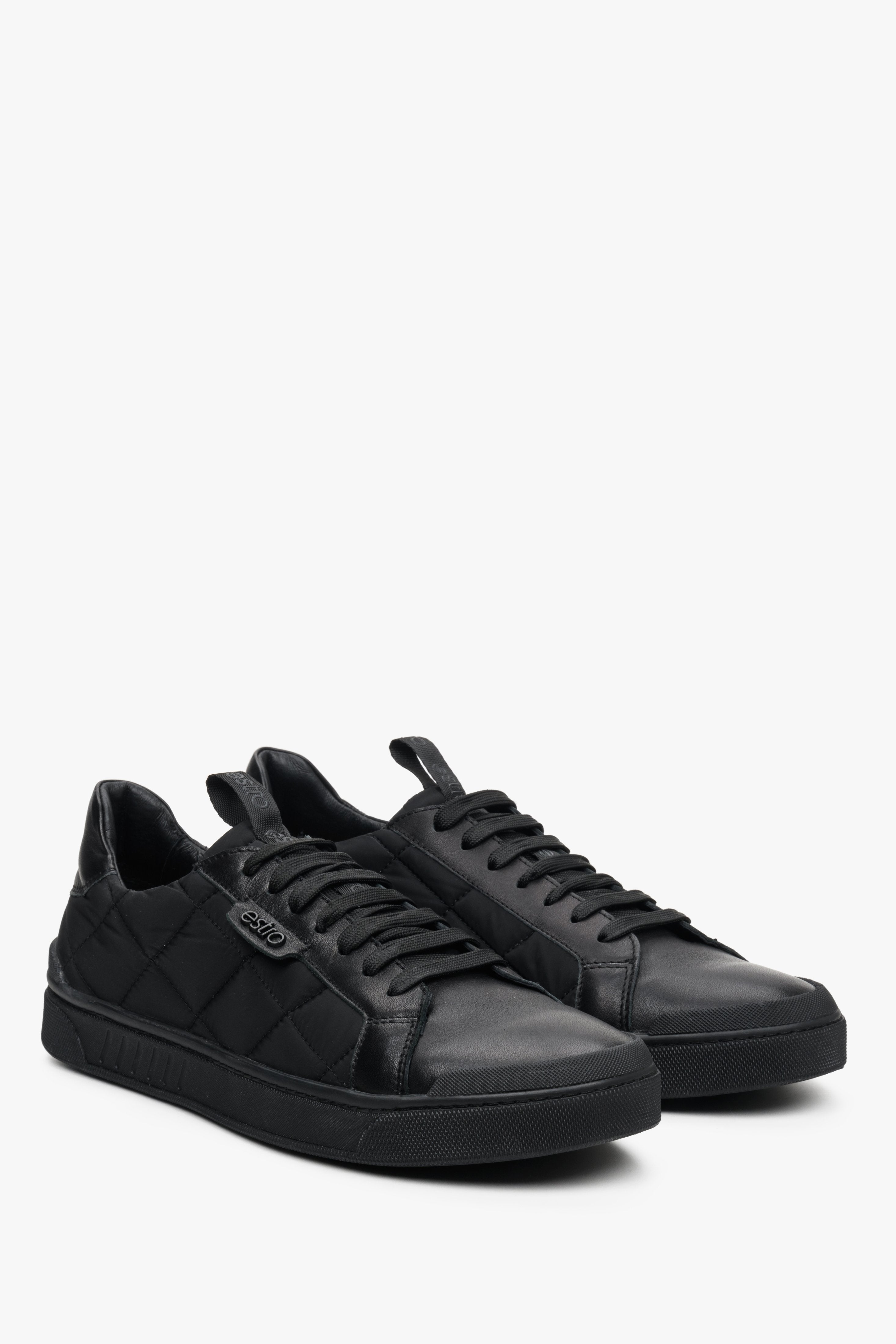 Black textile Estro men's sneakers with quilting for spring and jresien - presentation of the top and side seam of the shoes.