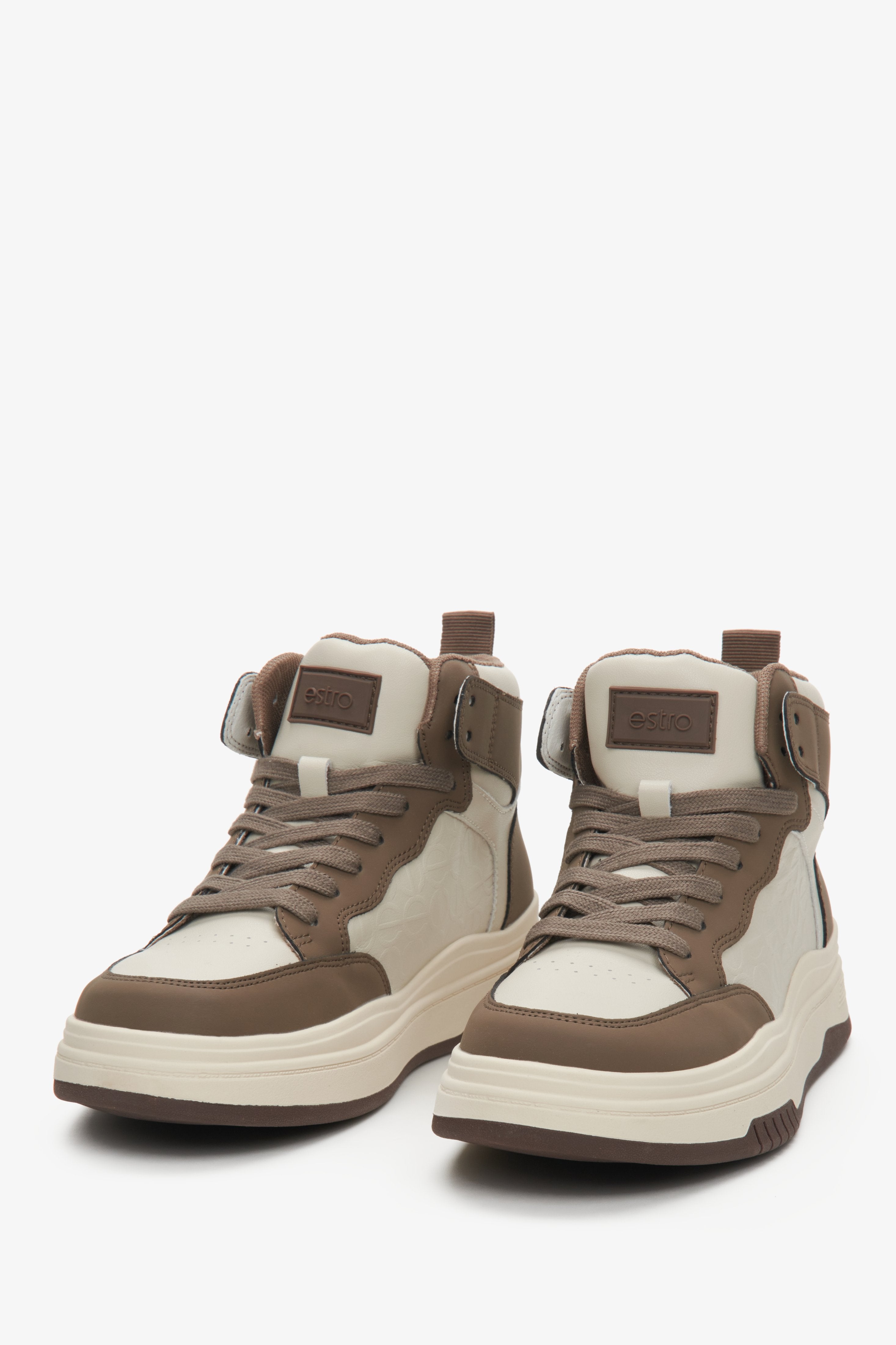 High-top women's sneakers made of genuine leather in beige-brown color by Estro - front view presentation of the model.