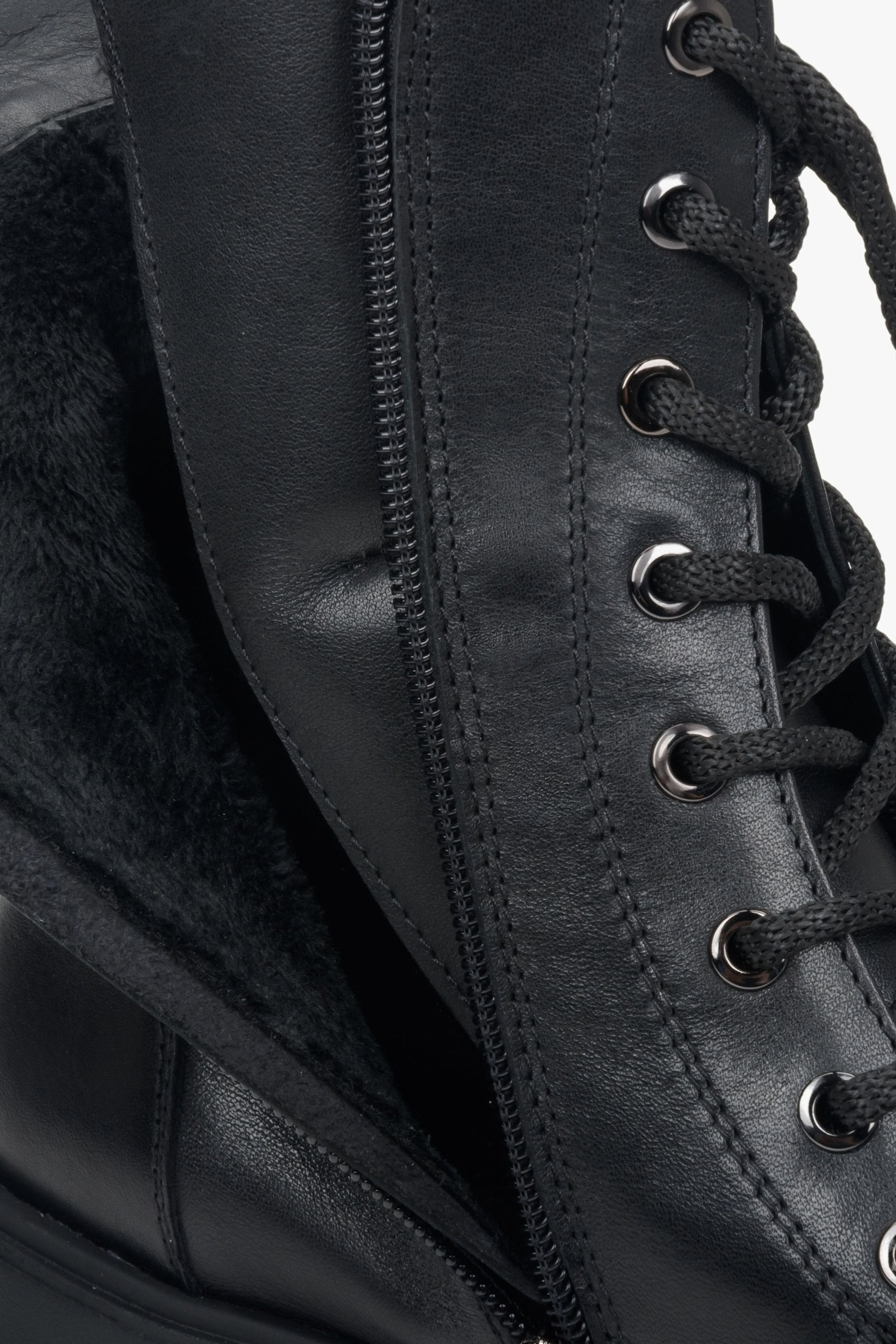 Black leather women's boots by Estro - close-up on the details.