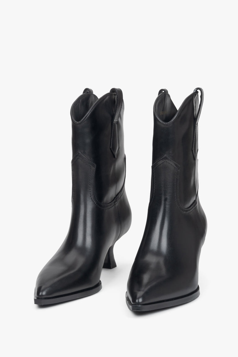 Leather black ankle boots for women with a low heel - front view presentation.